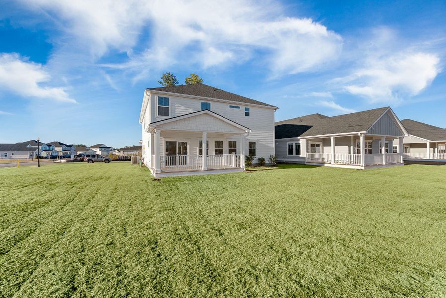 Exterior details and patio area of a home in The Coves at Lakes of Cane Bay, Summerville (Image 3). Exterior details and patio area of a home in The Coves at Lakes of Cane Bay, Summerville (Image 3).