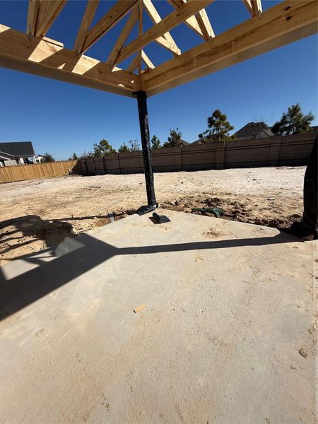 Relaxing covered patio with views of the HUGE backyard. Relaxing covered patio with views of the HUGE backyard.