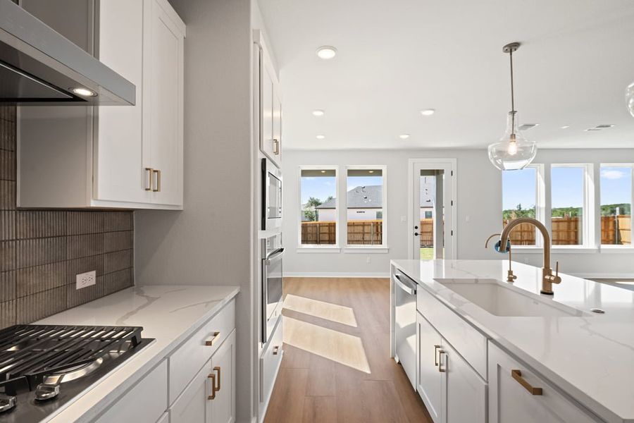 Furnished interior view inside a new home in Terrace Collection at Heritage, Dripping Springs (Image 8).