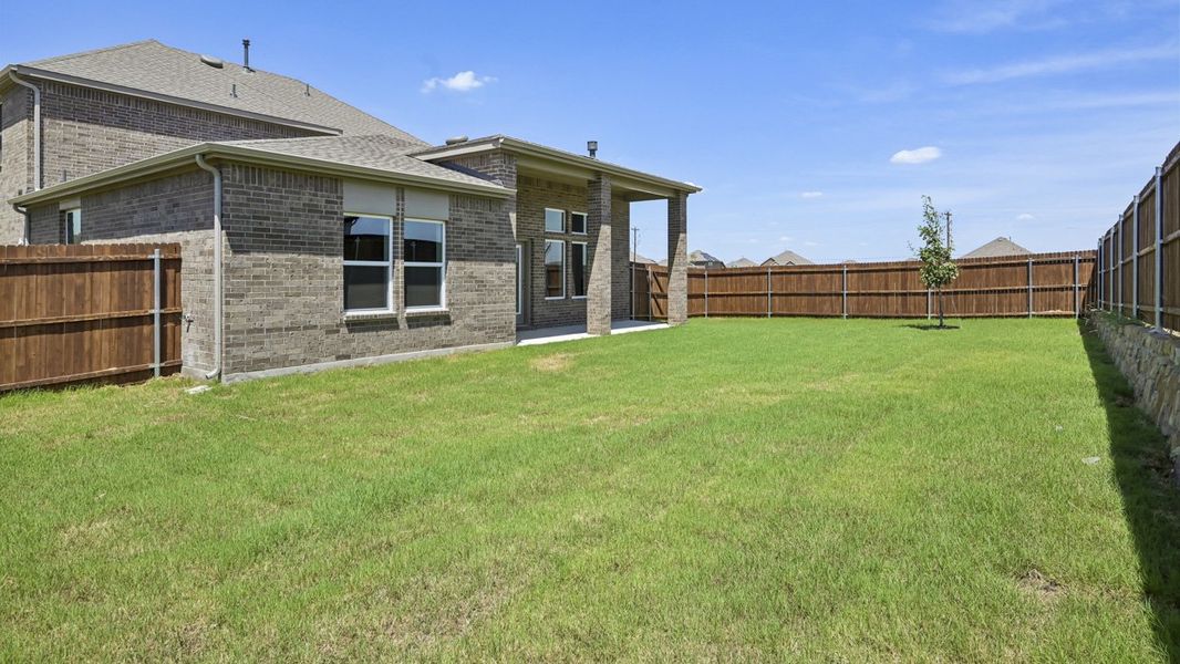 Exterior details and patio area of a home in Silverado, Aubrey (Image 2). Exterior details and patio area of a home in Silverado, Aubrey (Image 2).