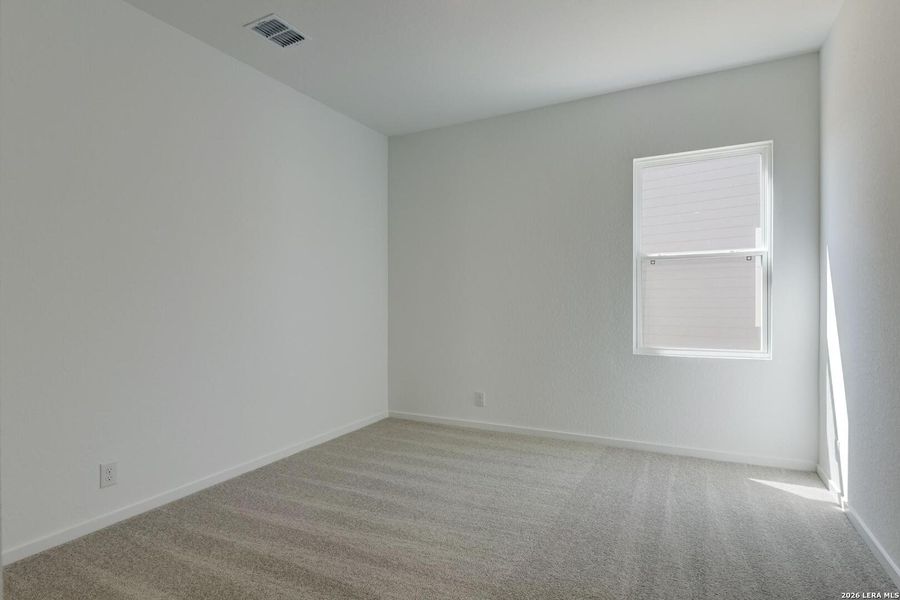 Spacious, unfurnished interior of a new home in Hennersby Hollow, San Antonio (Image 18).