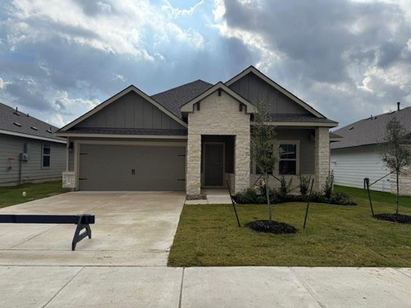 Front exterior of a new home in Southern Pointe, College Station, TX, highlighting curb appeal (Image 13).