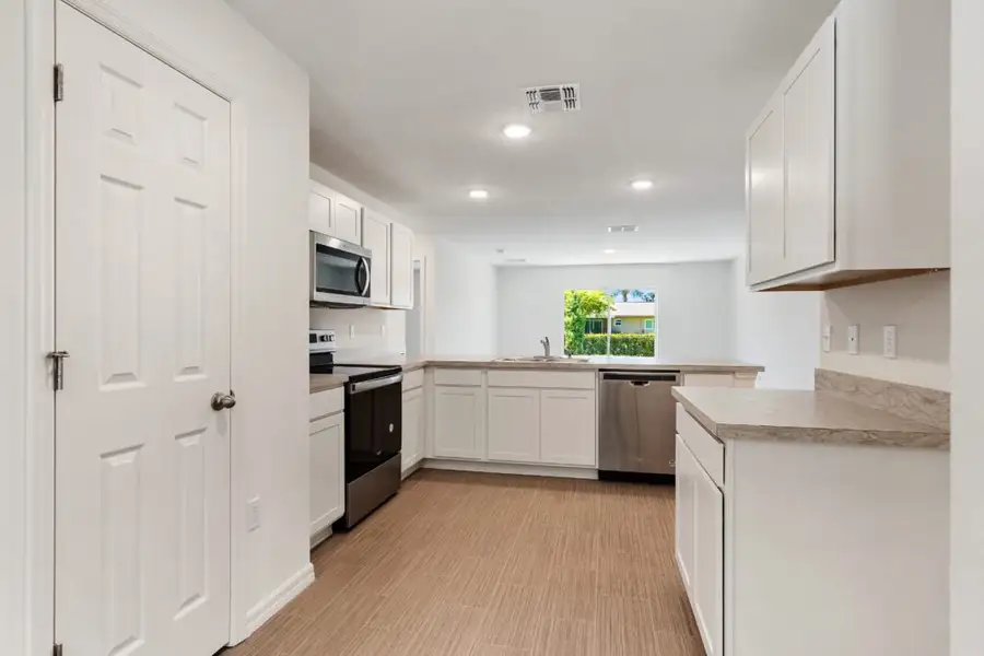 Furnished interior view inside a new home in Palm Bay, Palm Bay (Image 4). Furnished interior view inside a new home in Palm Bay, Palm Bay (Image 4).
