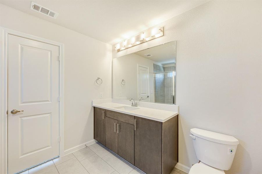 Furnished interior view inside a new home in East Oak Creek Elements, Commerce (Image 10).