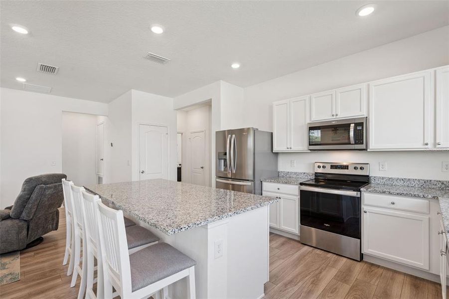 Furnished interior view inside a new home in , Mascotte (Image 41).