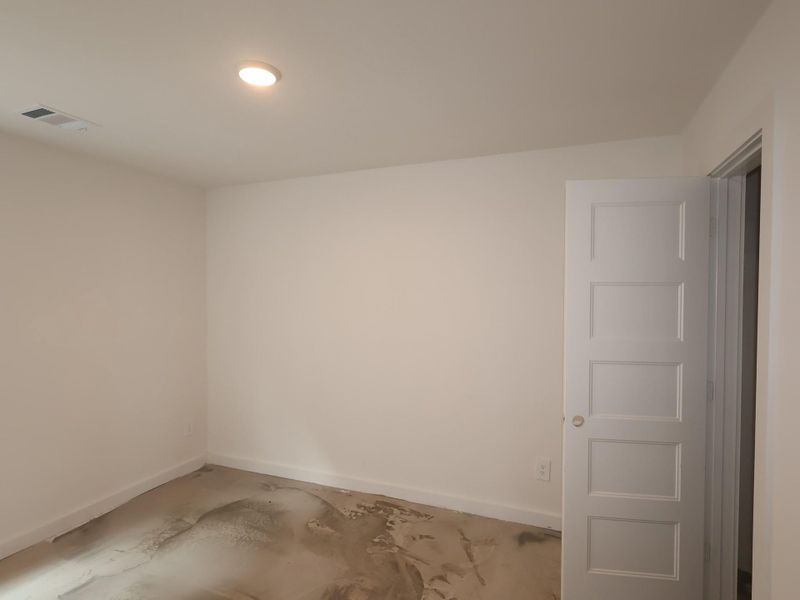 Spacious, unfurnished interior of a new home in Wildrye, Waller (Image 20).