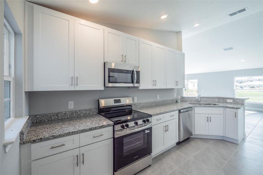 Furnished interior view inside a new home in , Kissimmee (Image 5).