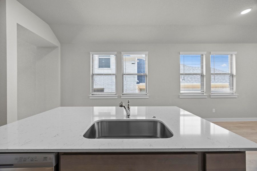 Kitchen in the Cedar home plan by Trophy Signature Homes – REPRESENTATIVE PHOTO