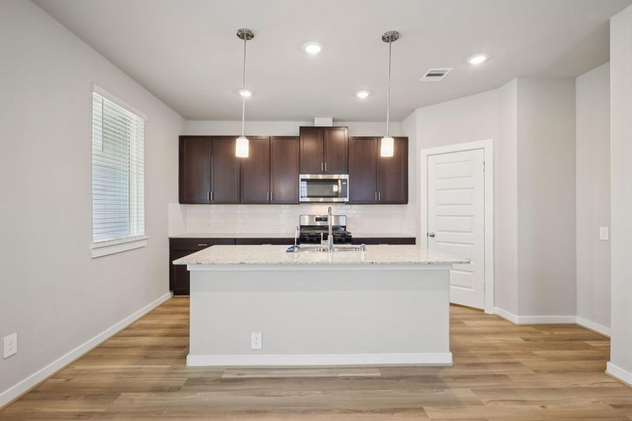 Furnished interior view inside a new home in Kemah Crossing - City Series, Kemah (Image 11). Furnished interior view inside a new home in Kemah Crossing - City Series, Kemah (Image 11).