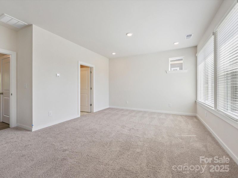 Spacious, unfurnished interior of a new home in Central Living at Craig, Charlotte (Image 17).