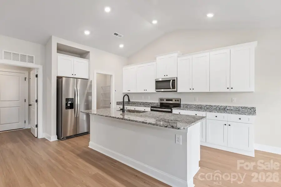 Furnished interior view inside a new home in Ascot Woods, Charlotte (Image 3).
