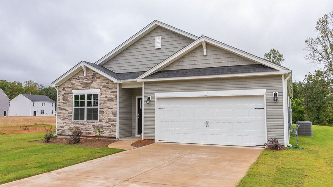 Front exterior of a new home in The Landing at Summerhaven, Mebane, NC, highlighting curb appeal (Image 16).
