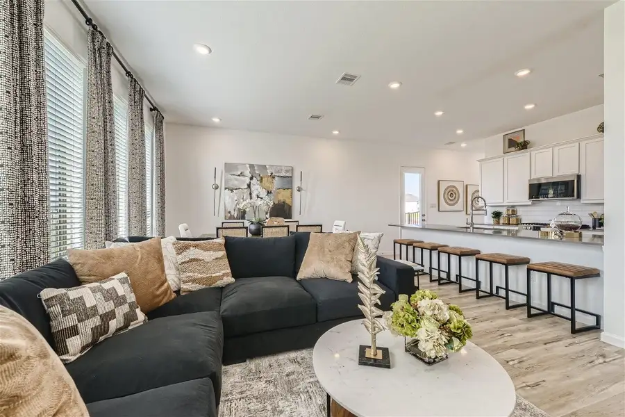 Furnished interior view inside a new home in Bridgeland, Cypress (Image 4).
