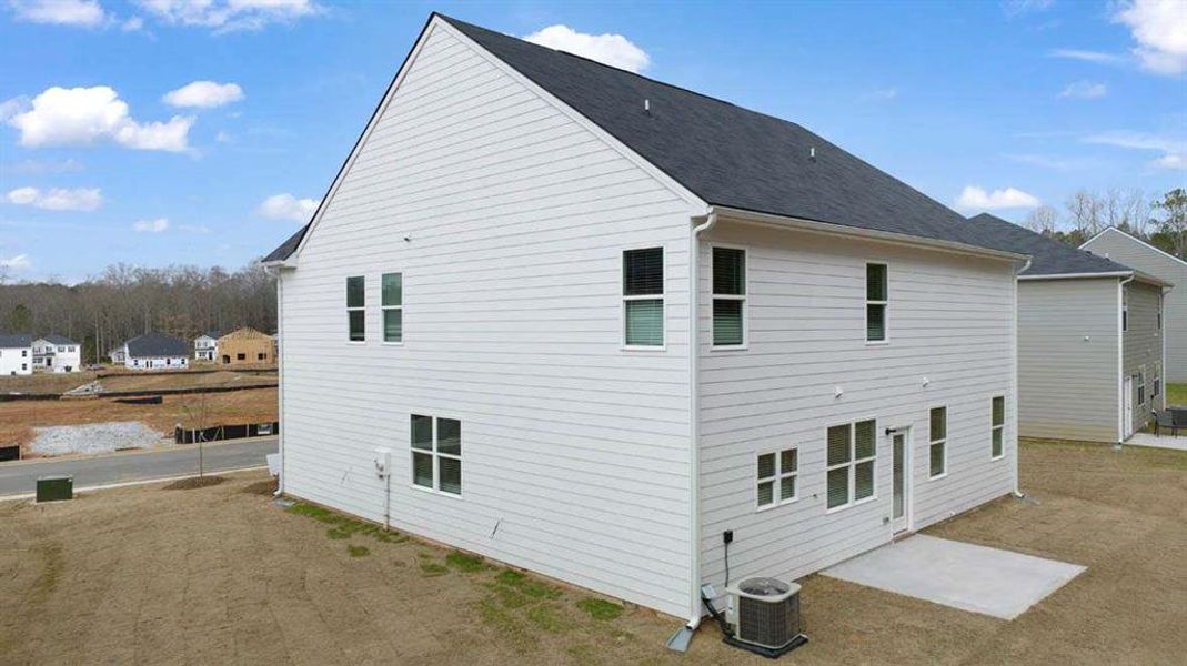 Exterior details and patio area of a home in Oakchase at Hampton, Hampton (Image 3).