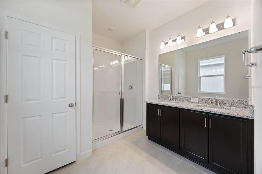 Furnished interior in a model home at Creekside at Rutland Ranch in Parrish (Image 6).