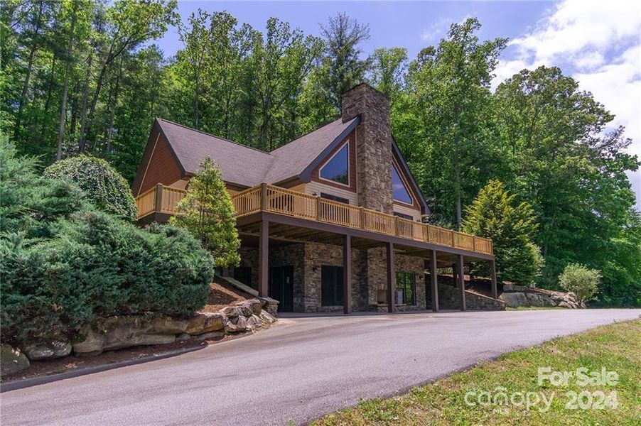 Front exterior of a new home in , Horse Shoe, NC, highlighting curb appeal (Image 2). Front exterior of a new home in , Horse Shoe, NC, highlighting curb appeal (Image 2).