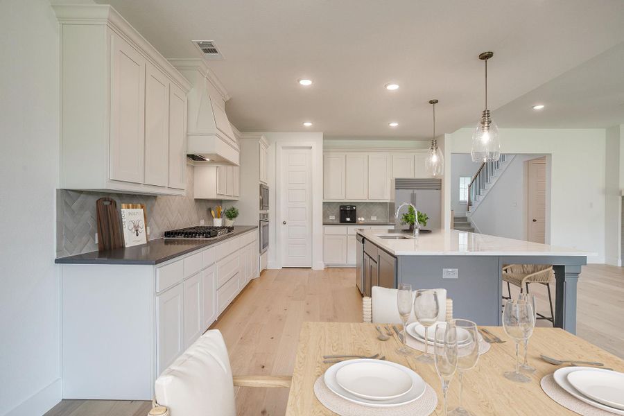 Representative furnished interior of a home built from the Eleanor by Graham Hart Home Builder in Sweetgrass, Haslet (Image 17).