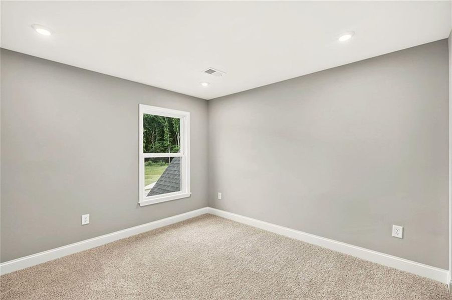 Spacious, unfurnished interior of a new home in Hidden Fields, Hoschton (Image 32). Spacious, unfurnished interior of a new home in Hidden Fields, Hoschton (Image 32).
