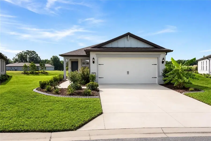 Front exterior of a new home in , Ocala, FL, highlighting curb appeal (Image 26). Front exterior of a new home in , Ocala, FL, highlighting curb appeal (Image 26).