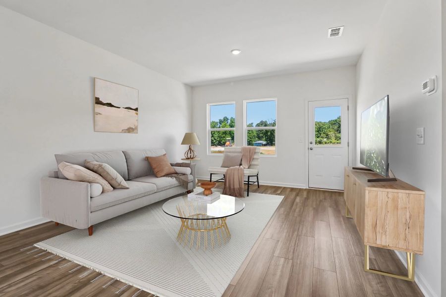 Representative furnished interior of a home built from the Larissa by Starlight Homes in Crescent Pointe, Carrollton (Image 6).
