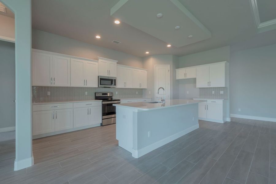 Representative furnished interior of a home built from the Avery by Paytas Homes in The Reserve at Victoria, Deland (Image 11).