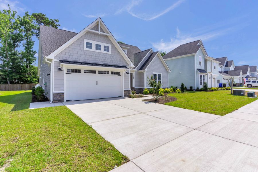 Representative exterior photo of a completed home built from the The Bradley by RobuckHomes in Windwater, Hampstead, NC (Image 33).