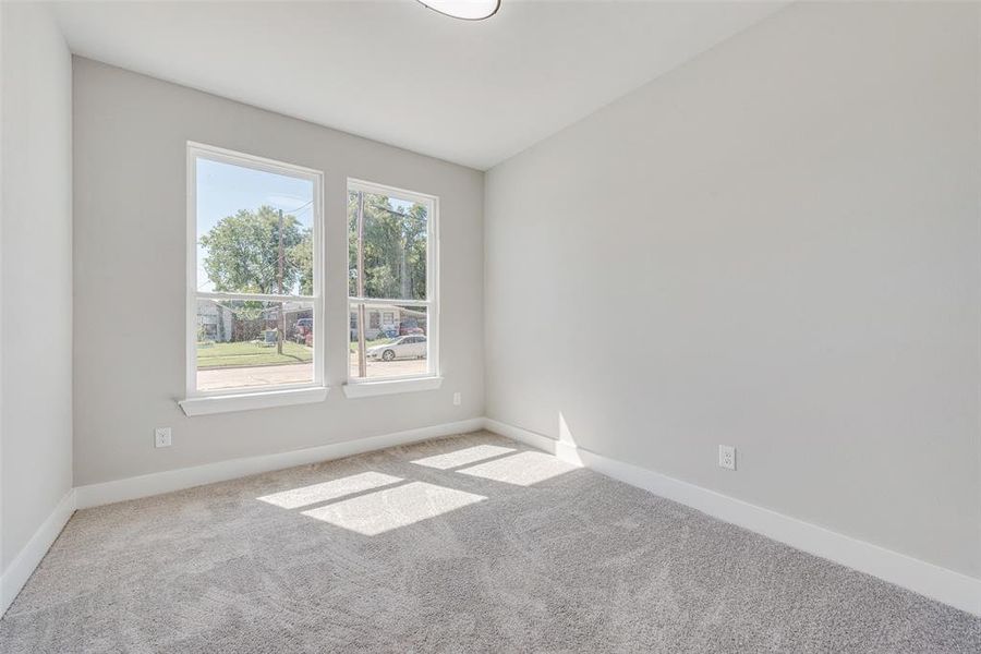 Empty room with light carpet