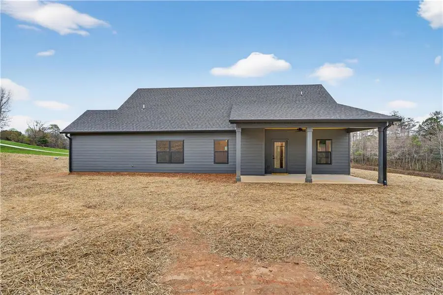 Exterior details and patio area of a home in , Ellijay (Image 3).
