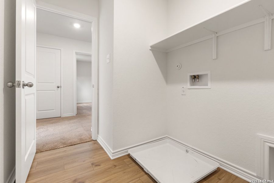 Spacious, unfurnished interior of a new home in Woodside Farms, Seguin (Image 13).