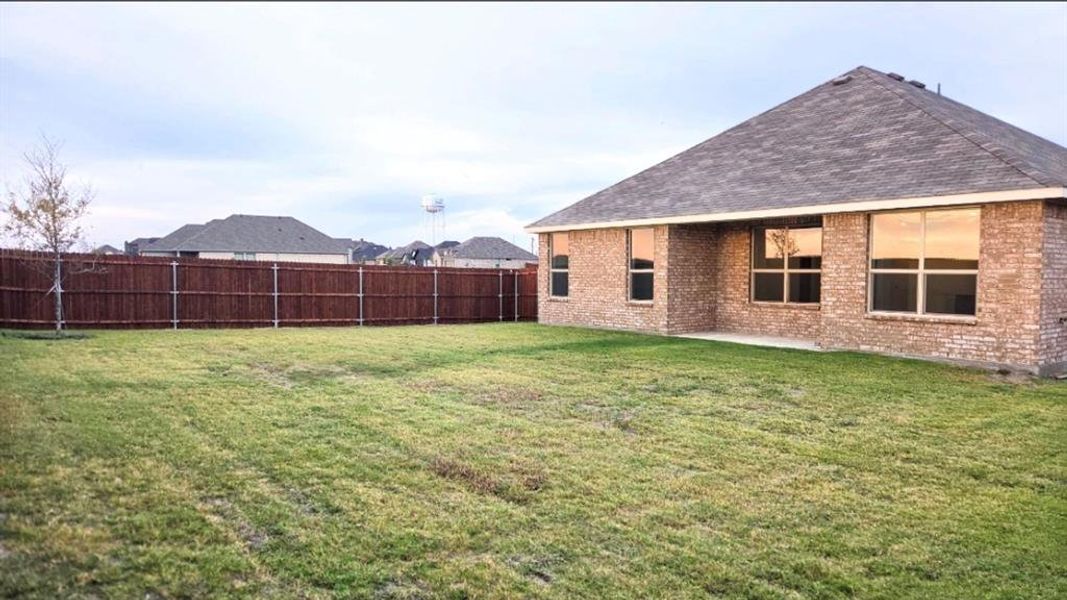 Exterior details and patio area of a home in Vista Point, Grandview (Image 2). Exterior details and patio area of a home in Vista Point, Grandview (Image 2).