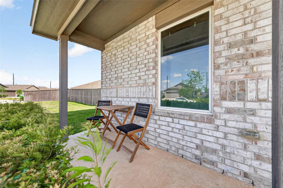 Exterior details and patio area of a home in Anniston, Katy (Image 25).