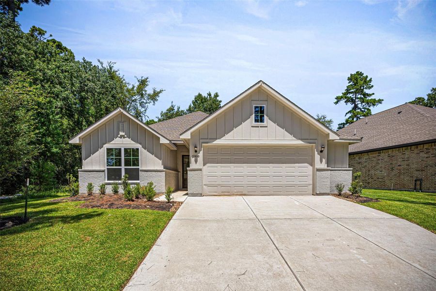 Front exterior of a new home in , Montgomery, TX, highlighting curb appeal (Image 19). Front exterior of a new home in , Montgomery, TX, highlighting curb appeal (Image 19).