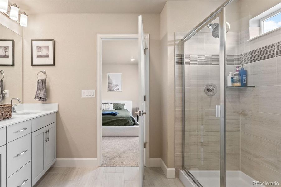 Furnished interior view inside a new home in Sunstone Village at Terrain, Castle Rock (Image 12).