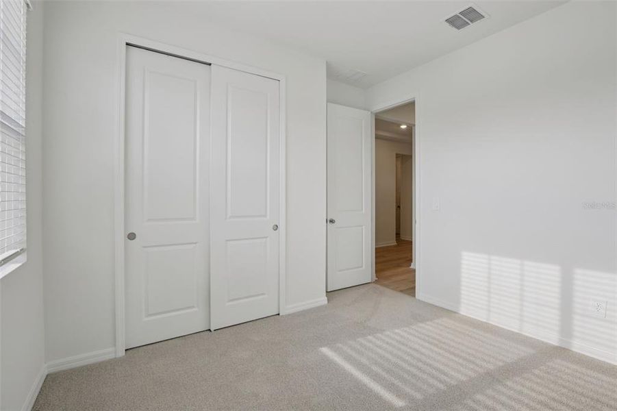 Spacious, unfurnished interior of a new home in Coasterra - Reserve Series, Palmetto (Image 18). Spacious, unfurnished interior of a new home in Coasterra - Reserve Series, Palmetto (Image 18).