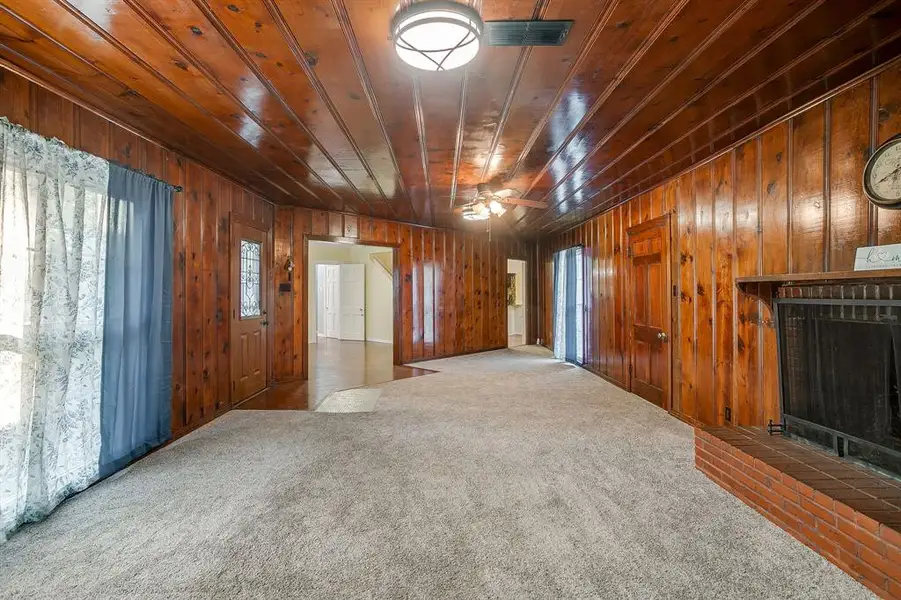 Gorgeous wood walls in the living room. Gorgeous wood walls in the living room.