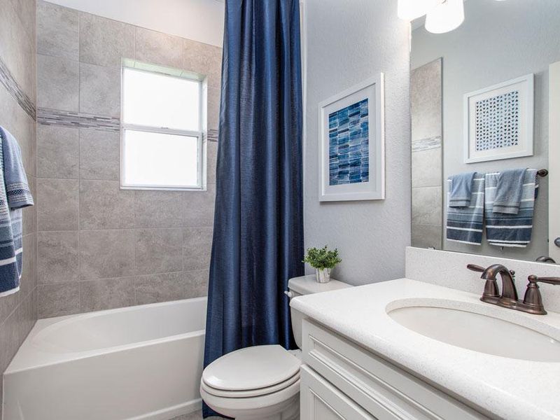 Convenient hall baths - Westin ll home plan by Highland Homes