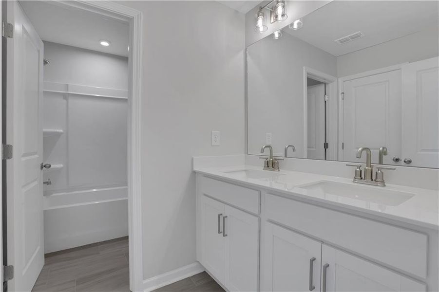 Furnished interior view inside a new home in The Paddocks at Doc Hughes, Buford (Image 11).