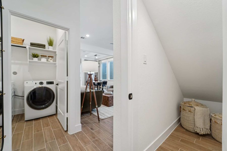 Representative furnished interior of a home built from the Versailles – Chateau Collection by Chesmar Homes in Bridgeland, Cypress (Image 6).