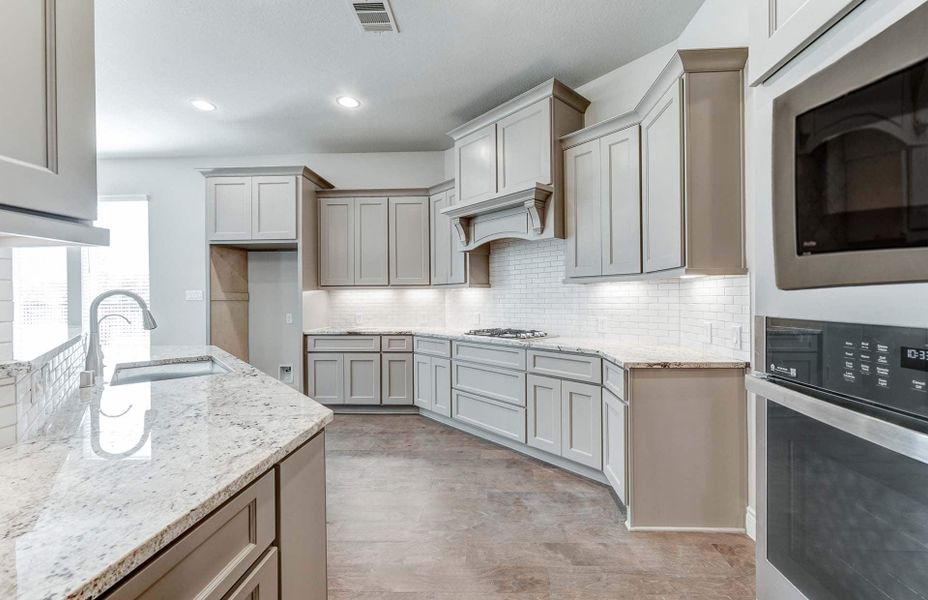 Representative furnished interior of a home built from the 3798 by Ravenna Homes in The Woodlands Hills 65′, Willis (Image 16).