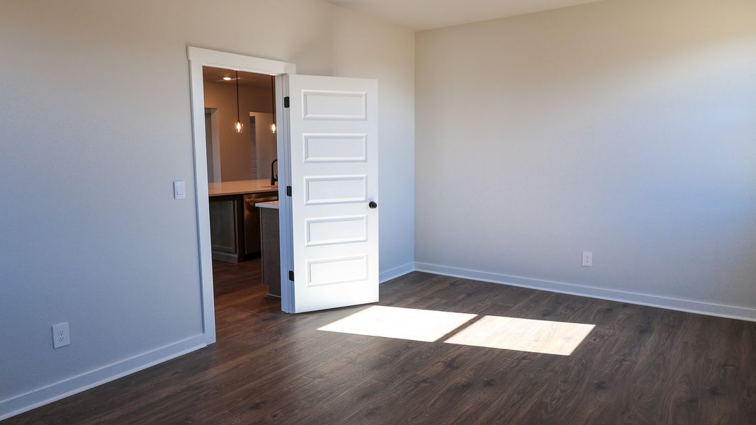 Representative unfurnished interior of a home built from the TISDALE by D.R. Horton in Harvest Point, Spring Hill (Image 44).