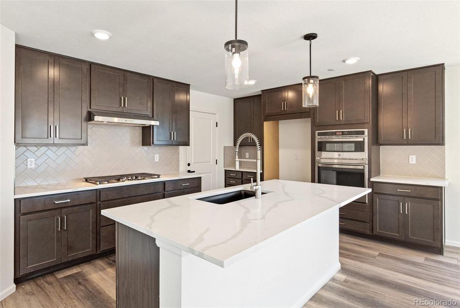 Furnished interior view inside a new home in Legato, Commerce City (Image 12).