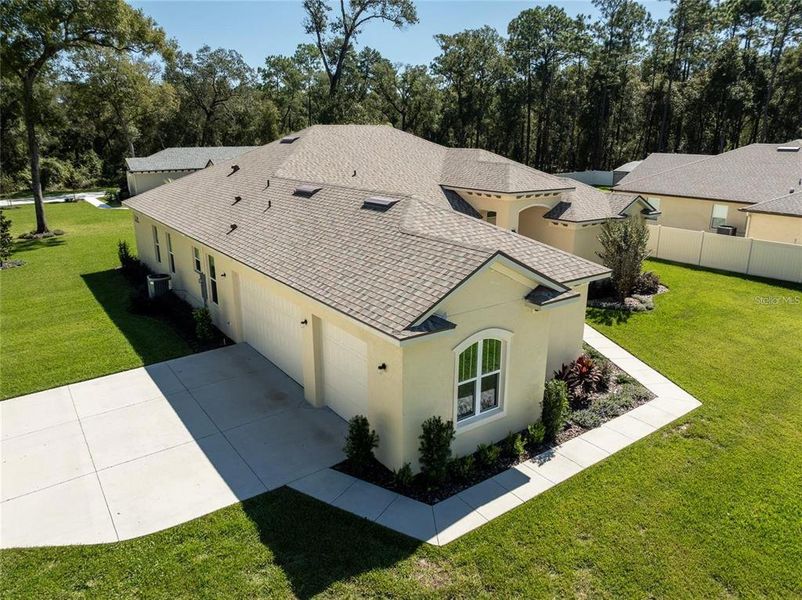 Front exterior of a new home in , Orange City, FL, highlighting curb appeal (Image 17).