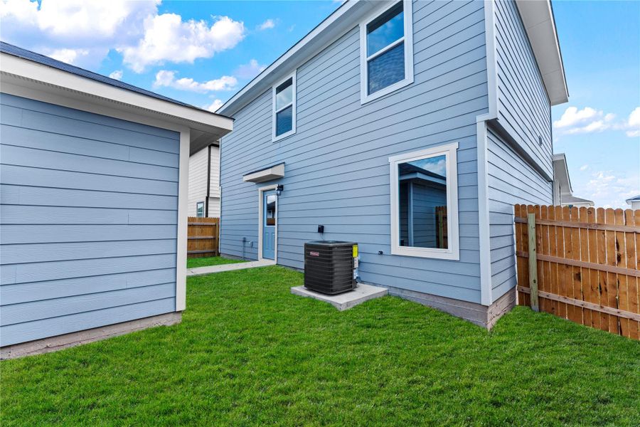 Exterior details and patio area of a home in Prairie Lakes, Buda (Image 3).