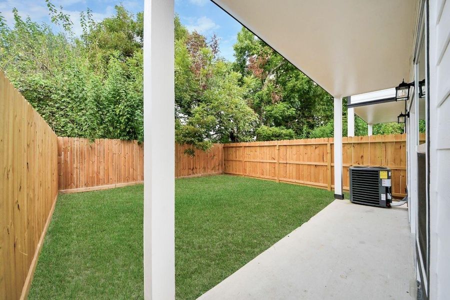 Exterior details and patio area of a home in , Houston (Image 3).