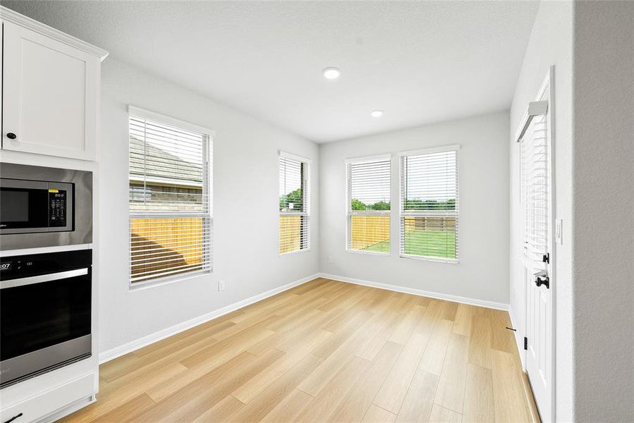 Breakfast dining area with back porch entry