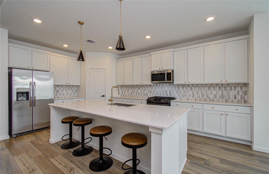 Furnished interior view inside a new home in Harvest Green, Richmond (Image 3).