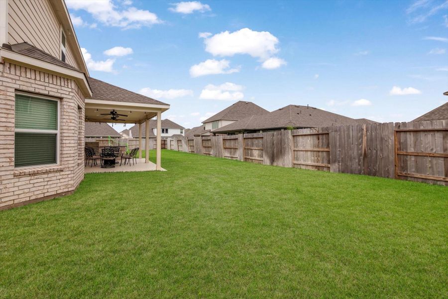Front exterior of a new home in Marvida, Cypress, TX, highlighting curb appeal (Image 25).
