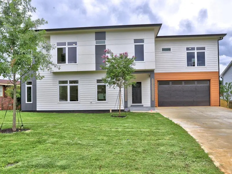 Front exterior of a new home in , Smyrna, GA, highlighting curb appeal (Image 28).