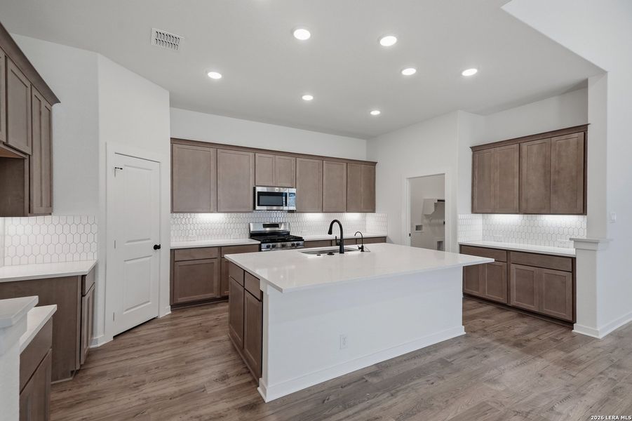 Furnished interior view inside a new home in The Crossvine, Schertz (Image 16).
