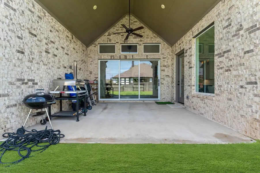 Exterior details and patio area of a home in , Fulshear (Image 23).